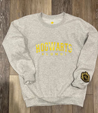 Load image into Gallery viewer, Hogwarts Alumni Sweatshirt with Hufflepuff Crest on Sleeve